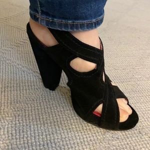 Black heeled sling backs